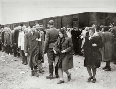 Jews from Subcarpathian Russia undergo a selection on the ramp at Auschwitz-Birkenau.