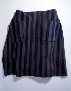 The striped skirt of a prison uniform worn at the Auschwitz concentration camp, 1941-5.