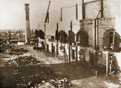 View of the crematoria ovens at Majdanek with piles of bones in front of them. After Jul 24, 1944.