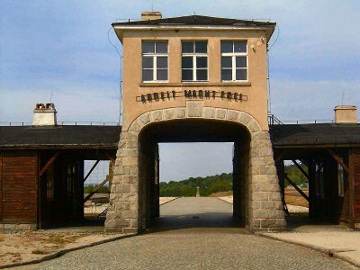 Gross-Rosen entrance gate with the phrase "Arbeit Mach Frei," 2005. From Wikipedia.